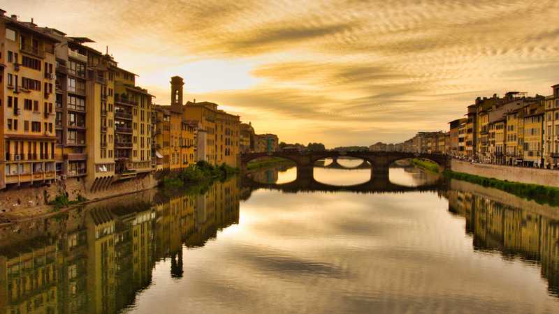 High angle shot of the gloomy Piazzale Michelangelo of Florence with reflections in the river