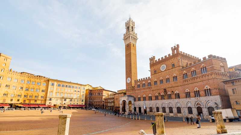 Morning view on the main square of Siena city in Italy
